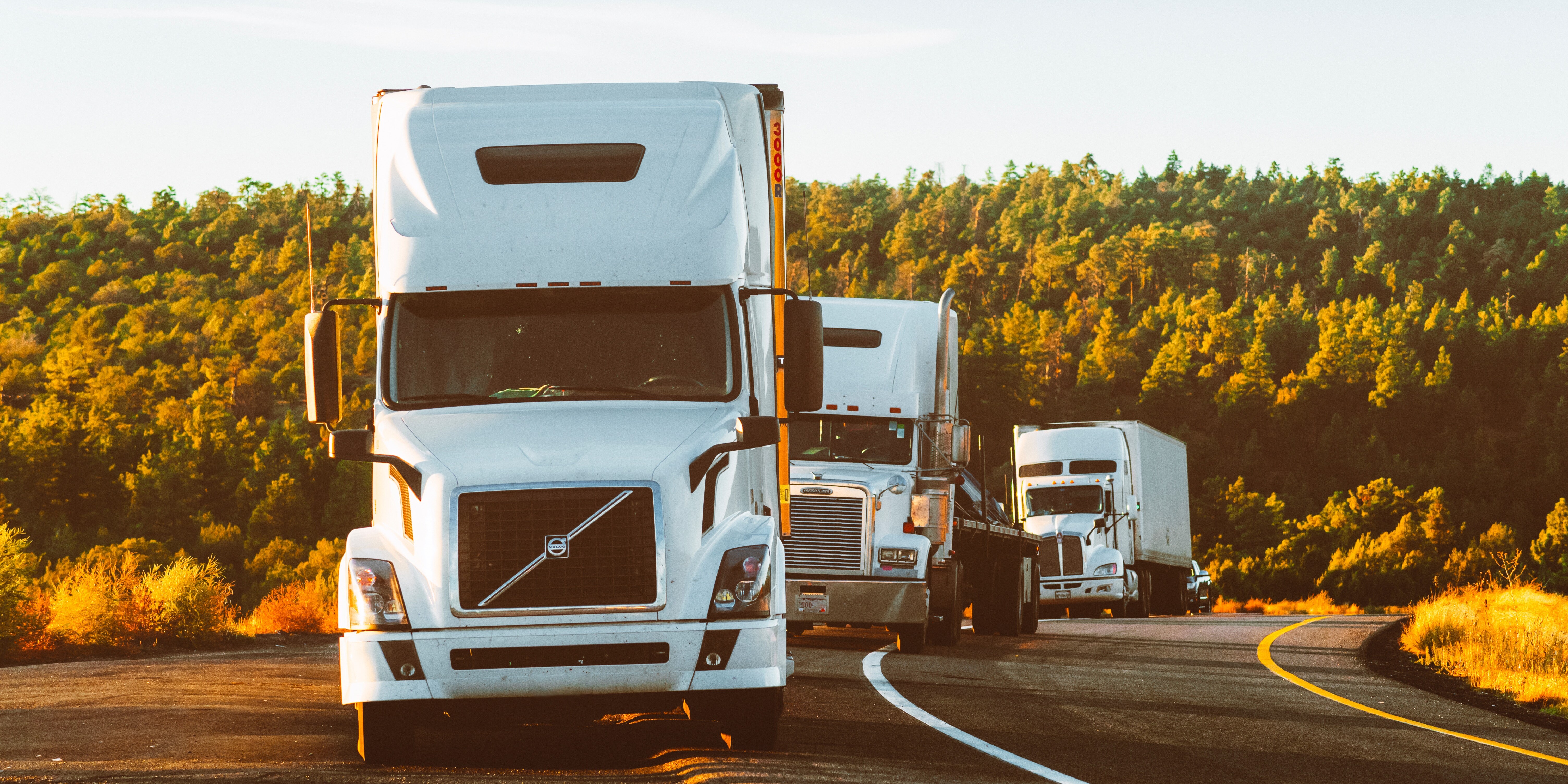 trucks on a highway trucks on a highway